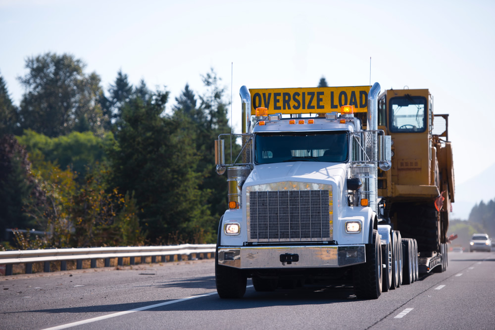Over Axle & Gross Weight Permits are required for some heavy loads oversized load truck on road
