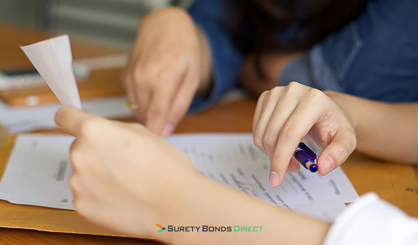Couple reviewing medial paperwork
