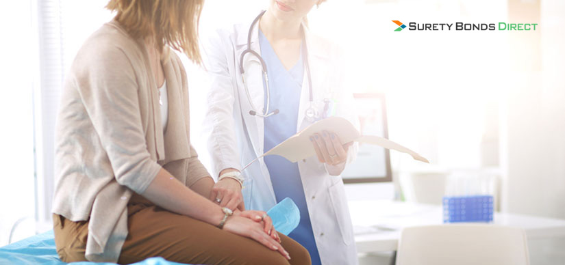 Doctor explaining medical device to patient