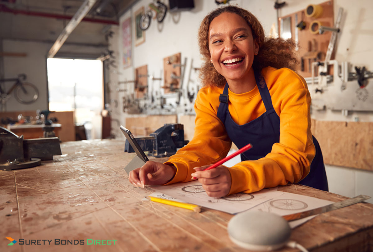 Smiling woman in workshop