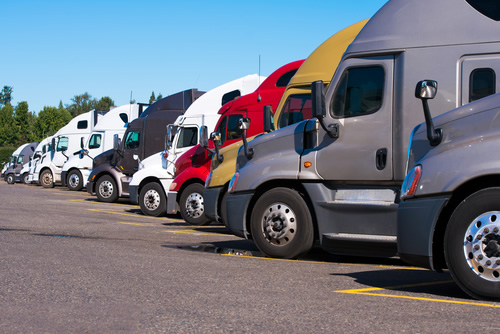 semi-trucks in a parking lot